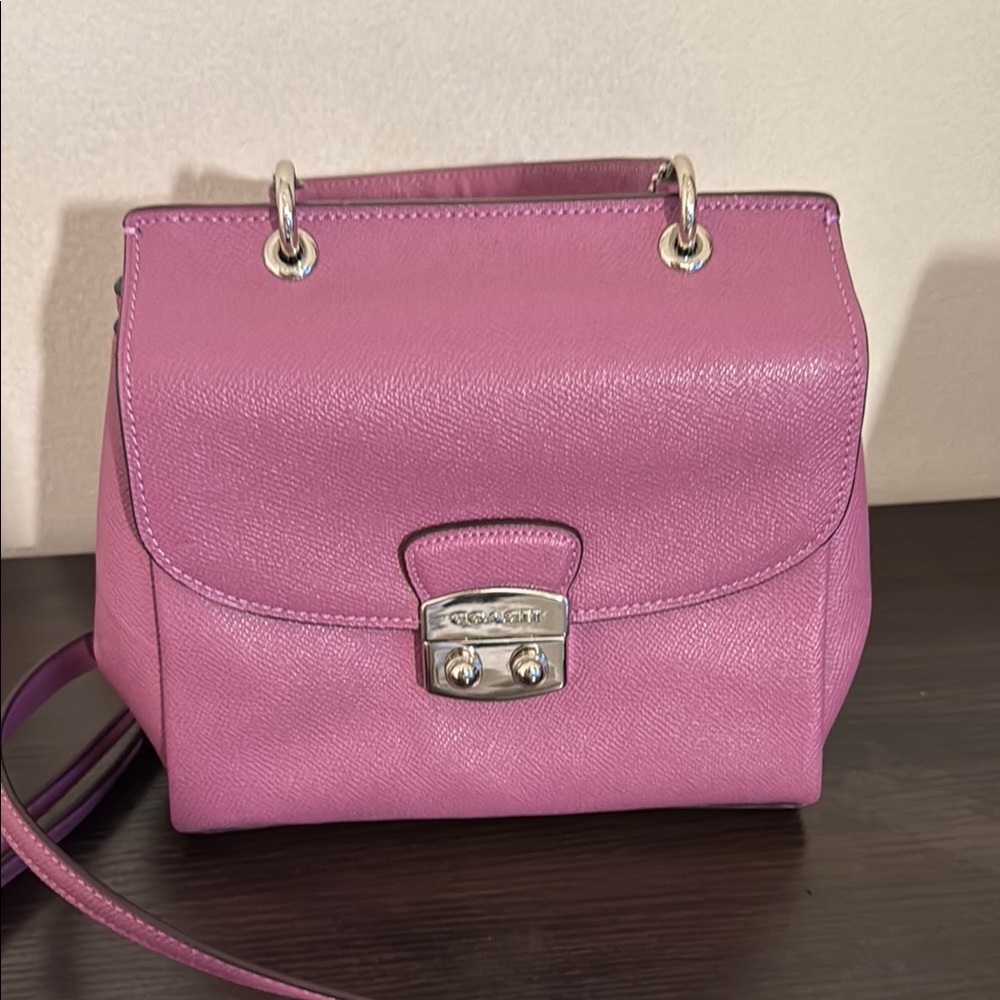 Coach Pink Crossbody Bag with Flap Closure and Silver Hardware